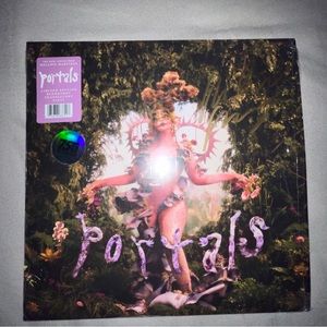 Signed portals CD and Vinyl. Selling for cheap I have two signed copies!